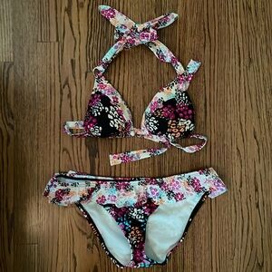 Two piece swimsuit. Triangle top and ruffle bottom.
